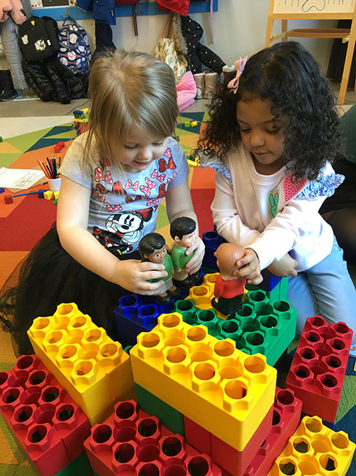 Photo of children playing with toys